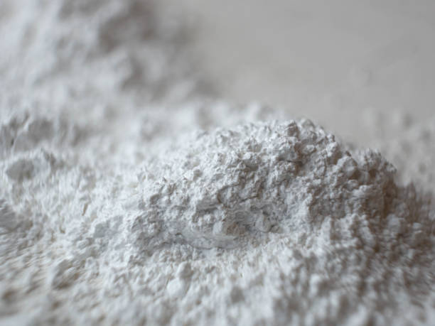 Scatter calcium carbonate powder. Close up photo.